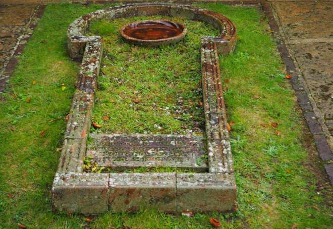 The gravestone of George and Mary Watts. He died in 1904 just as the chapel was completed; Mary died in 1938.